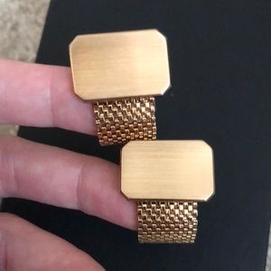 Gold toned cuff links